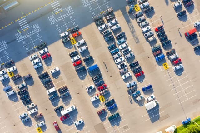 Used car dealership lot showcasing diverse vehicle inventory
